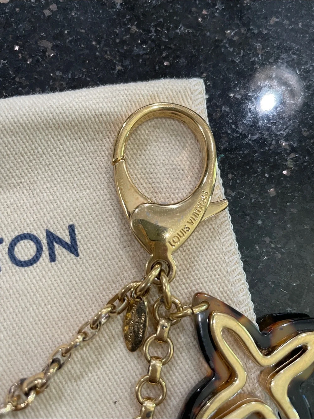 Louis Vuitton Insolence Bag Charm Metal and Tortoise Brown, Gold